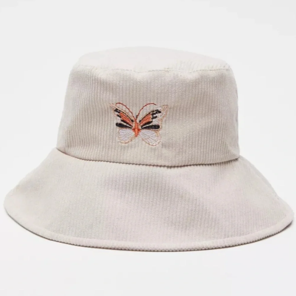 Urban Outfitters Monarch Butterfly Corduroy Bucket Hat Cream